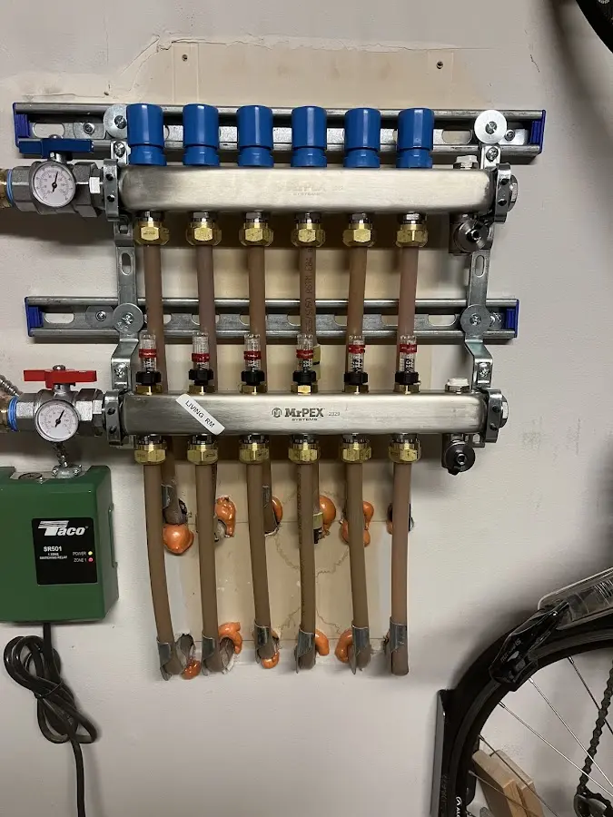 Plumber performing Gas Line Installation at a residential property in Perry